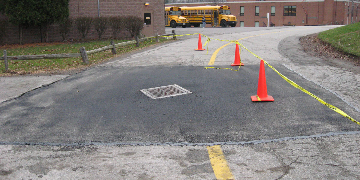 A picture of a catch basin repair at a local school.